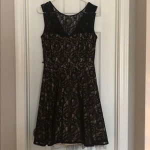 Brand new. Black lace cocktail dress